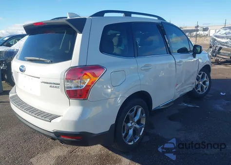 2016 Subaru Forester 2.5I Touring z USA, uszkodzony, nr VIN JF2SJAXC9GH453588